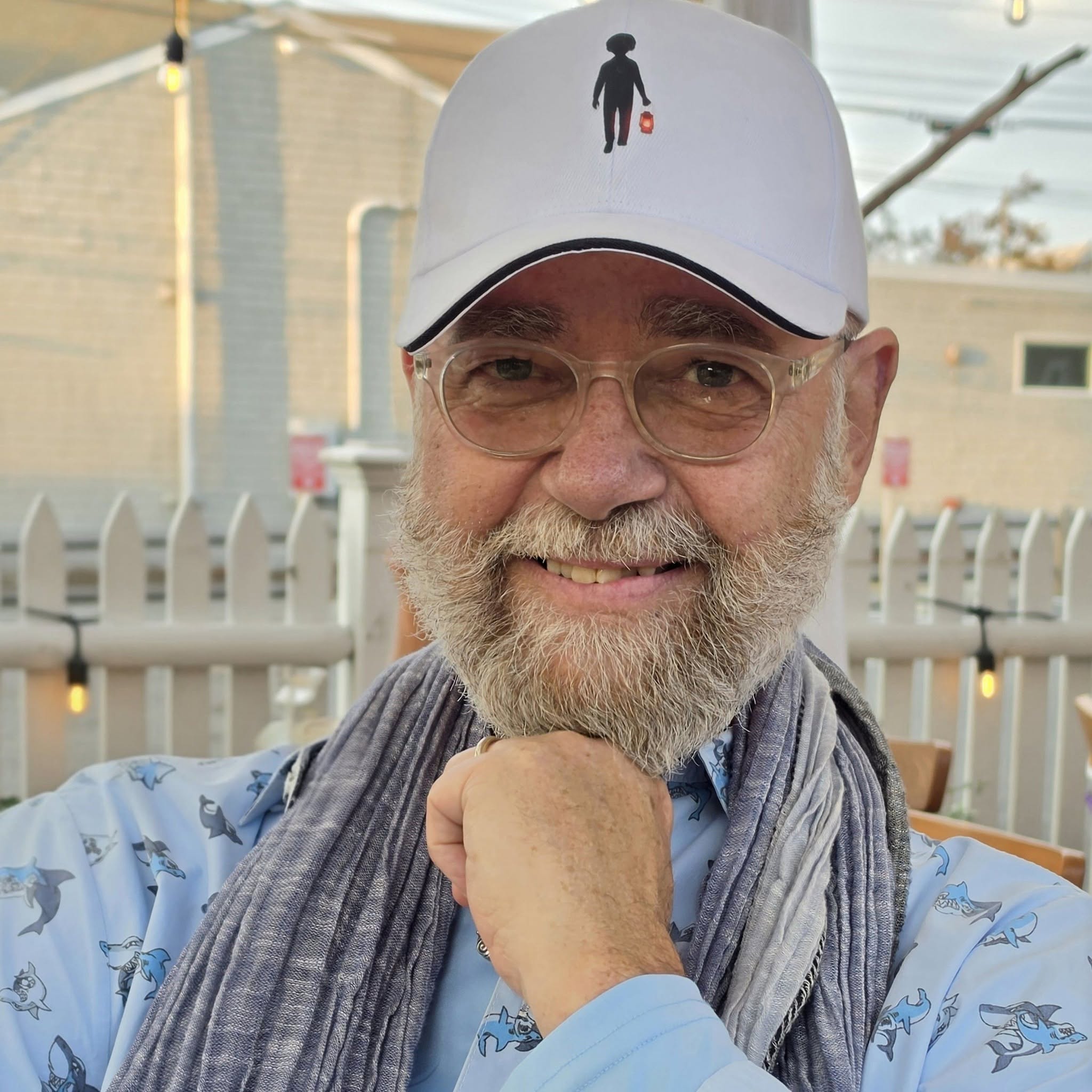 Keith wearing the Lantern Boy™ cap in Provincetown
